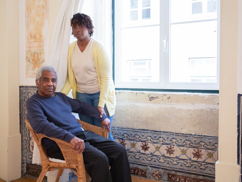 Nurse monitoring a senior participant's health and vital signs