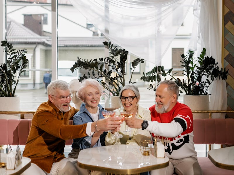 Group of seniors enjoying activities together at Sunrise Senior Care ADHC